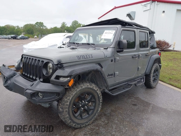 2022 Jeep Wrangler Unlimited Sport with VIN 1C4HJXDN9NW241154, listed as a IAAI auction lot 40211944 with 31,344 mi miles and . Bid and sale history available at DreamBid. Image 2.