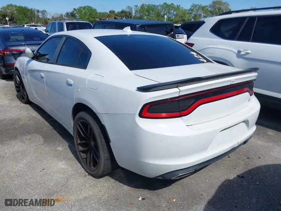 2016 Dodge Charger Road/Track with VIN 2C3CDXCT5GH241563, listed as a IAAI auction lot 41315509 with 83,030 mi miles. Bid and sale history available at carsss.com. Image 3.