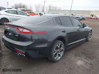 2018 Kia Stinger GT with VIN KNAE35LC4J6027939, listed as a IAAI auction lot 41790058 with 82,723 mi miles. Bid and sale history available at carsss.com. Image 4.