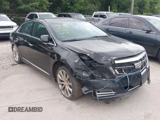 2017 Cadillac XTS Luxury z VIN 2G61M5S32H9158776, wystawiony jako IAAI lot #42528442 z przebiegiem 90 680 mil mil oraz . Historia ofert i sprzedaży dostępna na DreamBid. Obrazek 1.