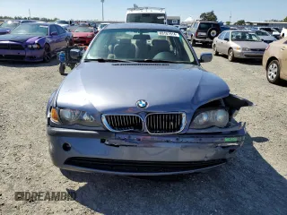 2003 BMW 3 Series 325i with VIN WBAET37453NJ37219, listed as a Copart auction lot 69101914 with 100,816 mi miles and Salvage Title. Bid and sale history available at carsss.com. Image 5.