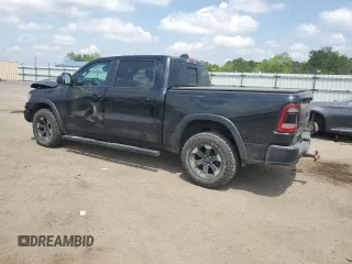 2019 Ram 1500 Rebel z VIN 1C6SRFLT8KN618140, wystawiony jako Copart lot #54734815 z przebiegiem 145 040 mil mil oraz Szkoda całkowita • Salvage title. Historia ofert i sprzedaży dostępna na DreamBid. Obrazek 2.