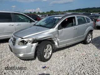 2011 Dodge Caliber Mainstreet z VIN 1B3CB3HA7BD297366, wystawiony jako Copart lot #67606874 z przebiegiem Nie podano mil oraz Szkody całkowita. Historia ofert i sprzedaży dostępna na DreamBid. Obrazek 1.