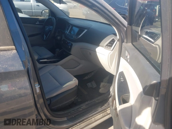 2018 Hyundai Tucson SEL z VIN KM8J33A42JU681606, wystawiony jako IAAI lot #41067514 z przebiegiem 150 119 mil mil oraz . Historia ofert i sprzedaży dostępna na DreamBid. Obrazek 5.