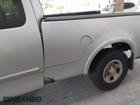 2003 Ford F-150 XL с VIN 2FTRX18W03CA23003, выставлен на аукционе IAAI как лот 42403479 с пробегом 316 789 миль миль и . История ставок и продаж доступна на DreamBid. Изображение 6.