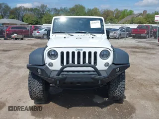 2016 Jeep Wrangler Unlimited Sport z VIN 1C4HJWDG5GL308803, wystawiony jako IAAI lot #42181473 z przebiegiem 41 621 mil mil oraz . Historia ofert i sprzedaży dostępna na DreamBid. Obrazek 13.