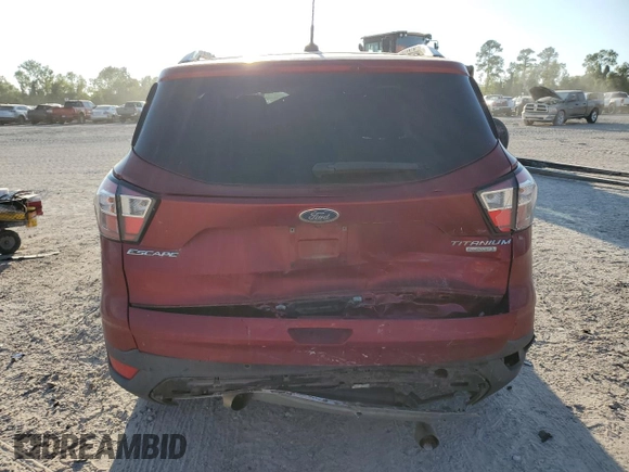 2017 Ford Escape Titanium with VIN 1FMCU0J97HUD52930, listed as a Copart auction lot 71851014 with 101,467 mi miles and Salvage Title. Bid and sale history available at carsss.com. Image 6.