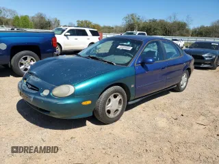 1997 Ford Taurus GL z VIN 1FALP52U2VG260801, wystawiony jako Copart lot #48804985 z przebiegiem 124 576 mil mil oraz Szkoda całkowita • Salvage title. Historia ofert i sprzedaży dostępna na DreamBid. Obrazek 1.