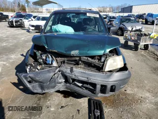 1999 Honda CR-V LX with VIN JHLRD184XXC083344, listed as a Copart auction lot 86395264 with 165,141 mi miles and Salvage Title. Bid and sale history available at carsss.com. Image 5.