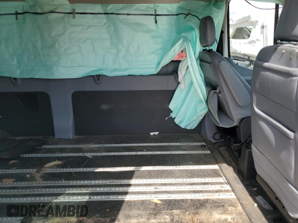 2018 Ford Transit Passenger XL z VIN 1FBZX2CM4JKB47817, wystawiony jako Copart lot #54428465 z przebiegiem 204 352 mil mil oraz Szkoda całkowita • Salvage title. Historia ofert i sprzedaży dostępna na DreamBid. Obrazek 11.