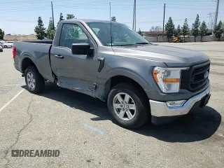2021 Ford F-150 XL with VIN 1FTMF1C58MKE24095, listed as a Copart auction lot 57686455 with 60,583 mi miles and Salvage title. Bid and sale history available at DreamBid. Image 13.