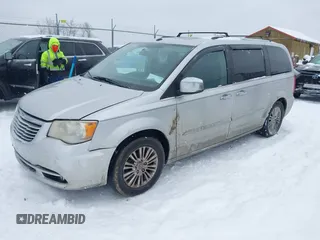 2011 Chrysler Town & Country Limited z VIN 2A4RR6DG3BR609061, wystawiony jako IAAI lot #41632696 z przebiegiem 201 975 mil mil oraz . Historia ofert i sprzedaży dostępna na DreamBid. Obrazek 2.
