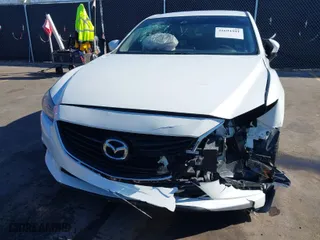 2017 Mazda Mazda6 Touring with VIN JM1GL1V54H1109471, listed as a IAAI auction lot 41694391 with 134,408 mi miles. Bid and sale history available at carsss.com. Image 6.