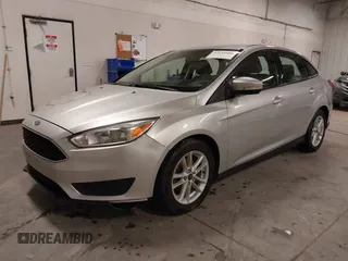 2017 Ford Focus SE z VIN 1FADP3F20HL245291, wystawiony jako IAAI lot #42194880 z przebiegiem 93 764 mil mil oraz . Historia ofert i sprzedaży dostępna na DreamBid. Obrazek 17.