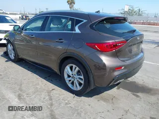 2018 Infiniti QX30 Premium with VIN SJKCH5CP5JA054091, listed as a IAAI auction lot 42471932 with 28,713 mi miles and . Bid and sale history available at DreamBid. Image 3.