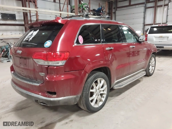 2014 Jeep Grand Cherokee Summit with VIN 1C4RJFJT4EC308729, listed as a IAAI auction lot 41694212 with 175,654 mi miles. Bid and sale history available at carsss.com. Image 4.