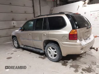 2006 GMC Envoy SLE with VIN 1GKDT13S062160490, listed as a IAAI auction lot 41610149 with 1 mi miles. Bid and sale history available at carsss.com. Image 3.