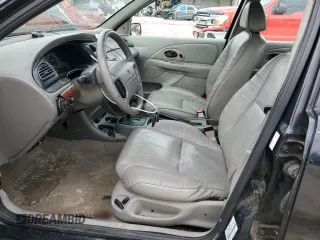 1998 Mercury Mystique z VIN 1MEFM66L7WK639796, wystawiony jako Copart lot #52880105 z przebiegiem 254 649 mil mil oraz Nie do naprawy. Historia ofert i sprzedaży dostępna na DreamBid. Obrazek 7.