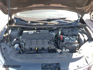 2015 Nissan Sentra S with VIN 3N1AB7AP5FY310374, listed as a IAAI auction lot 41653454 with 142,039 mi miles. Bid and sale history available at carsss.com. Image 10.