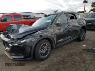 2021 Mazda CX-5 Sport with VIN JM3KFABM3M1334284, listed as a Copart auction lot 86915194 with 0 mi miles and Salvage Title. Bid and sale history available at carsss.com. Image 1.