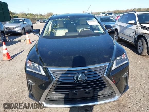 2019 Lexus RX with VIN 2T2BZMCA3KC193615, listed as a IAAI auction lot 42097232 with 33,797 mi miles. Bid and sale history available at carsss.com. Image 12.