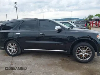 2014 Dodge Durango Citadel with VIN 1C4RDJEGXEC524883, listed as a IAAI auction lot 42357919 with 205,100 mi miles and . Bid and sale history available at DreamBid. Image 14.