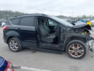2016 Ford Escape SE with VIN 1FMCU9GX9GUA62830, listed as a IAAI auction lot 42014409 with 1 mi miles. Bid and sale history available at carsss.com. Image 13.