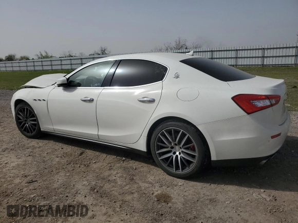 2017 Maserati Ghibli with VIN ZAM57XSA6H1233933, listed as a Copart auction lot 49089525 with 76,965 mi miles and Salvage Title. Bid and sale history available at carsss.com. Image 2.