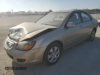 2009 Kia Spectra LX z VIN KNAFE222995618257, wystawiony jako Copart lot #56179025 z przebiegiem 270 087 mil mil oraz Szkoda całkowita • Salvage title. Historia ofert i sprzedaży dostępna na DreamBid. Obrazek 1.