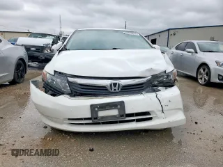 2012 Honda Civic LX z VIN 2HGFB2F50CH607469, wystawiony jako Copart lot #55878635 z przebiegiem 86 975 mil mil oraz Szkoda całkowita • Salvage title. Historia ofert i sprzedaży dostępna na DreamBid. Obrazek 5.