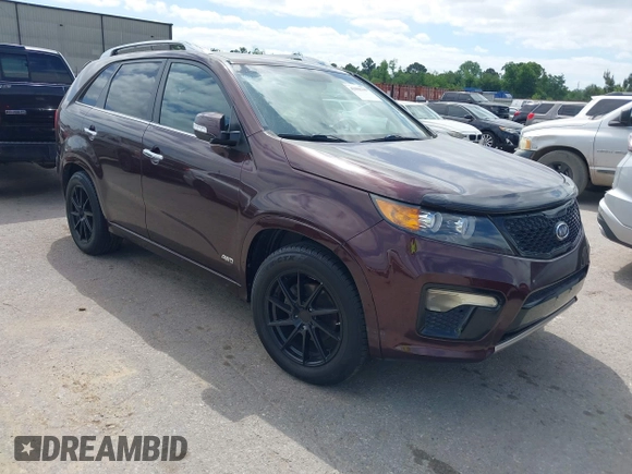 2012 Kia Sorento SX with VIN 5XYKWDA25CG249584, listed as a IAAI auction lot 42008349 with 214,381 mi miles. Bid and sale history available at carsss.com. Image 1.