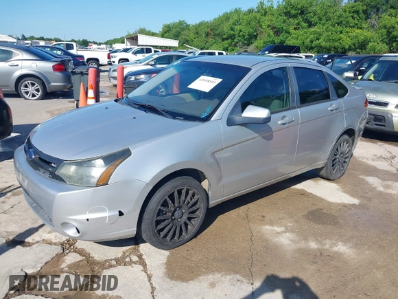 2010 Ford Focus SES with VIN 1FAHP3GN5AW115229, listed as a IAAI auction lot 42098503 with 156,127 mi miles. Bid and sale history available at carsss.com. Image 2.