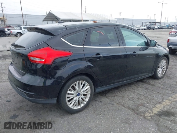 2017 Ford Focus Titanium with VIN 1FADP3N2XHL230766, listed as a IAAI auction lot 42386275 with 64,138 mi miles and . Bid and sale history available at DreamBid. Image 4.