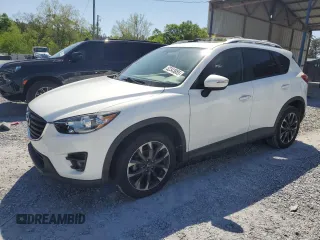 2016 Mazda CX-5 Grand Touring with VIN JM3KE4DY0G0819528, listed as a Copart auction lot 52343885 with 77,340 mi miles and Clean Title. Bid and sale history available at DreamBid. Image 1.