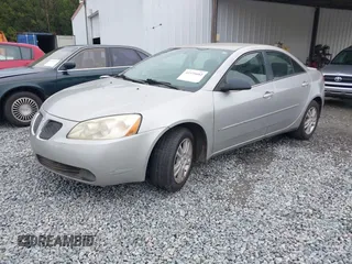 2006 Pontiac G6 6-Cyl z VIN 1G2ZG558464228524, wystawiony jako IAAI lot #42375602 z przebiegiem 172 972 mil mil oraz . Historia ofert i sprzedaży dostępna na DreamBid. Obrazek 2.