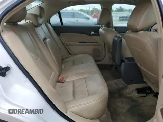 2012 Ford Fusion SEL z VIN 3FAHP0JA3CR184074, wystawiony jako Copart lot #51973675 z przebiegiem 192 732 mil mil oraz Szkoda całkowita • Salvage title. Historia ofert i sprzedaży dostępna na DreamBid. Obrazek 10.