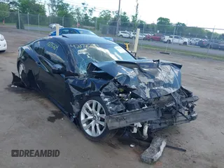 2013 Hyundai Genesis Coupe Premium z VIN KMHHT6KD5DU105396, wystawiony jako IAAI lot #42178264 z przebiegiem 95 548 mil mil oraz . Historia ofert i sprzedaży dostępna na DreamBid. Obrazek 1.
