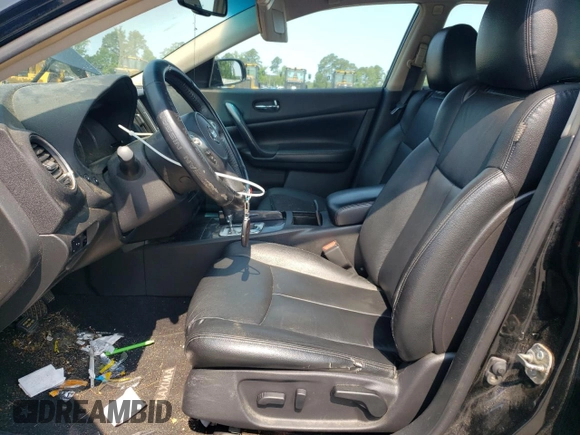 2013 Nissan Maxima S z VIN 1N4AA5AP1DC822083, wystawiony jako Copart lot #58932365 z przebiegiem 136 390 mil mil oraz Szkoda całkowita • Salvage title. Historia ofert i sprzedaży dostępna na DreamBid. Obrazek 7.