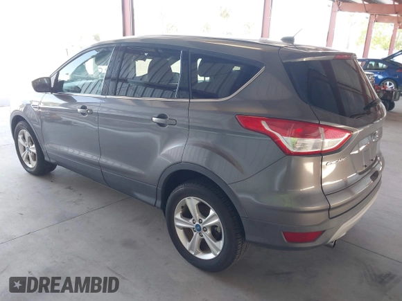 2013 Ford Escape SE with VIN 1FMCU0GX6DUC25019, listed as a IAAI auction lot 42165049 with 90,774 mi miles. Bid and sale history available at carsss.com. Image 3.