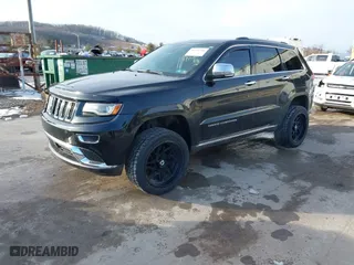 2014 Jeep Grand Cherokee Summit with VIN 1C4RJFJT8EC309026, listed as a IAAI auction lot 41590796 with 146,369 mi miles. Bid and sale history available at carsss.com. Image 17.