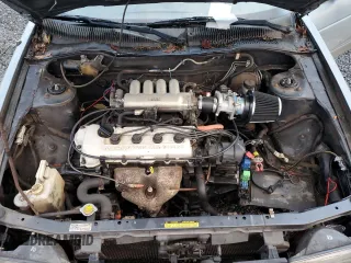 1992 Nissan Sentra E с VIN 1N4EB32A7NC702402, выставлен на аукционе Copart как лот 86629524 с пробегом 233 476 миль миль и Списание • Salvage title. История ставок и продаж доступна на DreamBid. Изображение 11.
