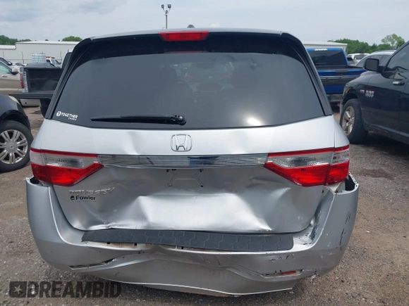 2012 Honda Odyssey EX-L with VIN 5FNRL5H66CB081323, listed as a IAAI auction lot 42465110 with 266,934 mi miles and . Bid and sale history available at DreamBid. Image 16.