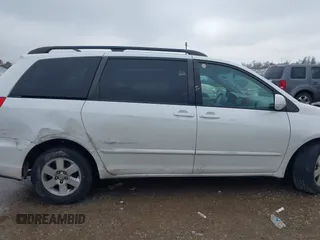 2010 Toyota Sienna XLE with VIN 5TDYK4CCXAS315235, listed as a IAAI auction lot 41451211 with 190,189 mi miles and . Bid and sale history available at carsss.com. Image 13.