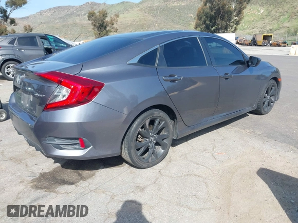 2019 Honda Civic Sedan Sport with VIN 2HGFC2F8XKH557203, listed as a IAAI auction lot 41846429 with 105,598 mi miles. Bid and sale history available at carsss.com. Image 4.