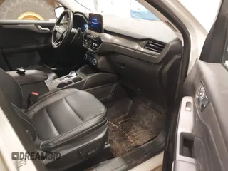 2021 Ford Escape Titanium Hybrid с VIN 1FMCU9DZXMUB03855, выставлен на аукционе IAAI как лот 41498132 с пробегом 63 892 миль миль и . История ставок и продаж доступна на DreamBid. Изображение 5.