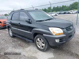 2007 Kia Sportage LX z VIN KNDJE723477366079, wystawiony jako IAAI lot #42358937 z przebiegiem 176 745 mil mil oraz . Historia ofert i sprzedaży dostępna na DreamBid. Obrazek 1.