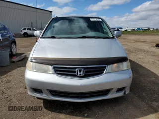 2002 Honda Odyssey EX z VIN 2HKRL186X2H006763, wystawiony jako Copart lot #57317075 z przebiegiem 282 090 mil mil oraz Szkoda całkowita • Salvage title. Historia ofert i sprzedaży dostępna na DreamBid. Obrazek 5.