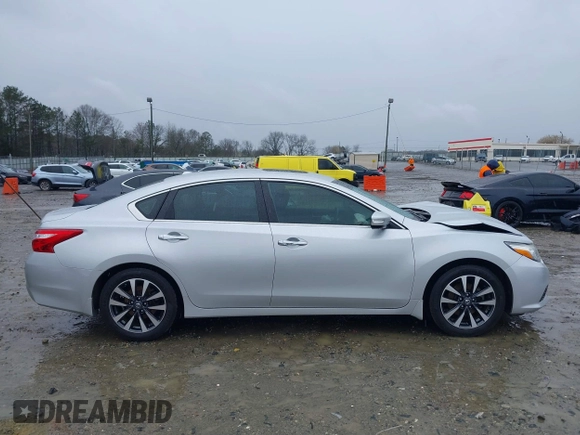 2016 Nissan Altima SV with VIN 1N4AL3AP5GC192300, listed as a IAAI auction lot 41765314 with 162,671 mi miles and . Bid and sale history available at DreamBid. Image 13.