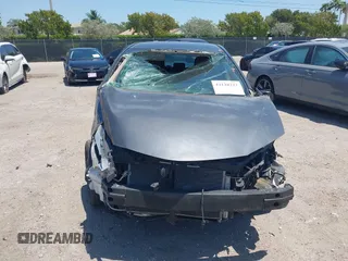 2015 Toyota Corolla L with VIN 2T1BURHEXFC449900, listed as a IAAI auction lot 42128227 with 127,479 mi miles and . Bid and sale history available at DreamBid. Image 13.