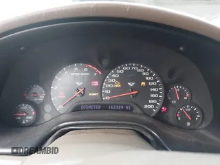 2004 Chevrolet Corvette with VIN 1G1YY22G445129880, listed as a IAAI auction lot 41216979 with 162,329 mi miles and . Bid and sale history available at DreamBid. Image 7.